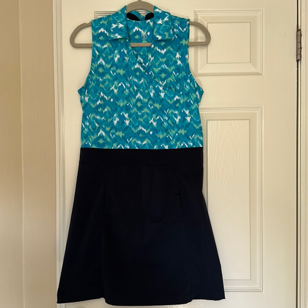 Tail golf dress! Front pockets.
